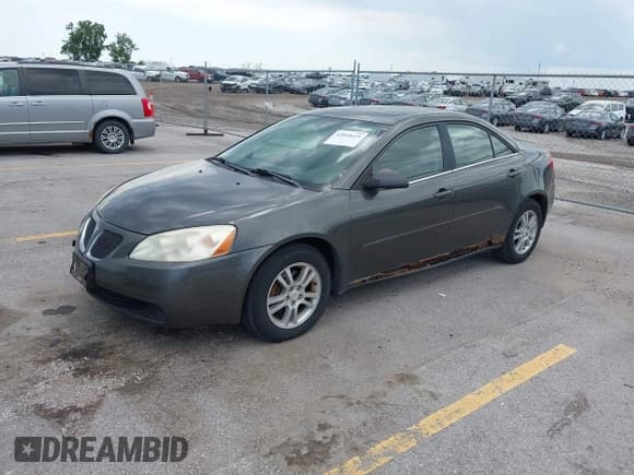 ✅ 2005 Pontiac G6 • VIN: 1G2ZG548954116740 • Lot: 42843615. Wystawiony na IAAI z przebiegiem 153 477 mil. Bezpłatny archiwum sprzedaży aukcyjnych z USA i szczegółowy raport historii pojazdu na DreamBid. Zdjęcie 2.