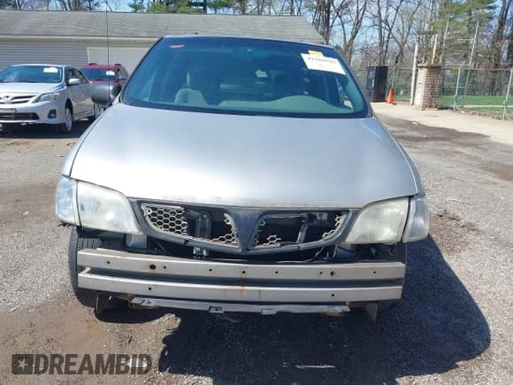 ✅ 2004 Pontiac Montana • VIN: 1GMDU03E94D189934 • Лот: 41968925. Опубликован ранее на IAAI с пробегом 143 411 миль. Бесплатный доступ к архиву аукционных продаж из США и подробный отчёт об истории автомобиля на DreamBid. Изображение 13.
