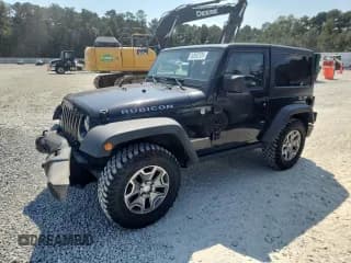 ✅ 2015 Jeep Wrangler Rubicon Hard Rock • VIN: 1C4BJWCG7FL662926 • Лот: 80992525. Опубликован ранее на Copart с пробегом 63 734 миль. Бесплатный доступ к архиву аукционных продаж из США и подробный отчёт об истории автомобиля на DreamBid. Изображение 1.