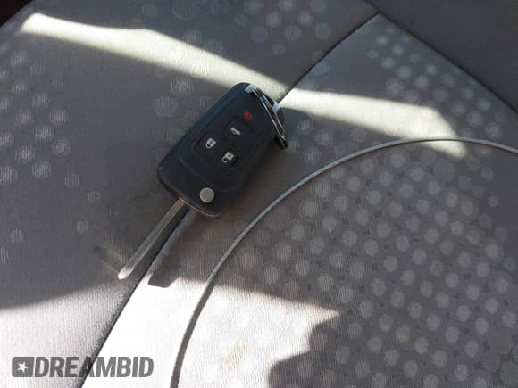 2016 Chevrolet Sonic LS z VIN 1G1JA5SH8G4180115, wystawiony jako IAAI lot #43336527 z przebiegiem 97 703 mil mil oraz . Historia ofert i sprzedaży dostępna na DreamBid. Obrazek 11.