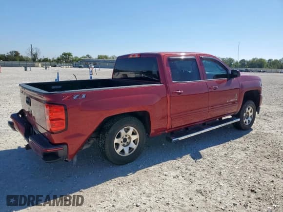 ✅ 2018 Chevrolet Silverado 1500 LT • VIN: 3GCUKREC3JG256486 • Лот: 91678585. Опубликован ранее на Copart с пробегом 96 021 миль. Бесплатный доступ к архиву аукционных продаж из США и подробный отчёт об истории автомобиля на DreamBid. Изображение 3.