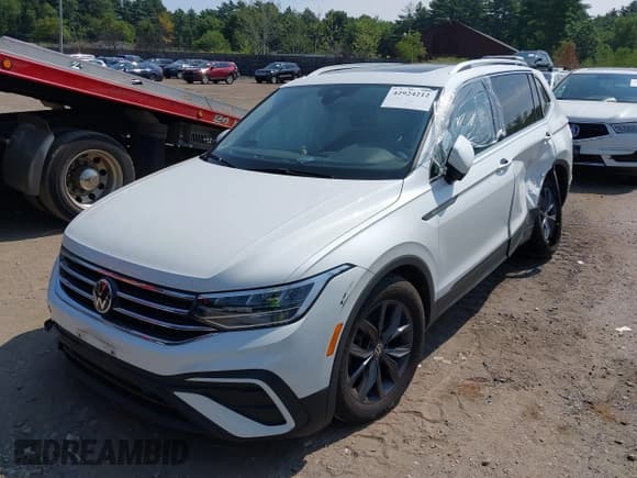 ✅ 2023 Volkswagen Tiguan SE • VIN: 3VVMB7AX2PM003264 • Lot: 42924212. Listed on IAAI with 24,014 mi. Free auction sales archive from the USA and detailed vehicle history report at DreamBid. Image 2.