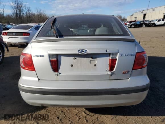 2006 Hyundai Elantra GLS z VIN KMHDN56D16U192259, wystawiony jako Copart lot #80632784 z przebiegiem 139 359 mil mil oraz Szkoda całkowita • Salvage title. Historia ofert i sprzedaży dostępna na DreamBid. Obrazek 6.