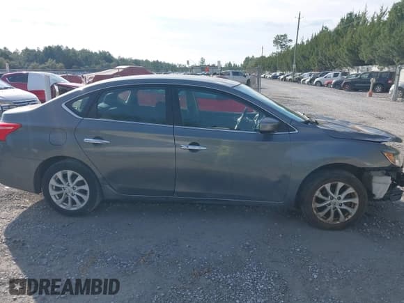 ✅ 2019 Nissan Sentra S • VIN: 3N1AB7AP6KY374806 • Лот: 43787364. Опубликован ранее на IAAI с пробегом 126 182 миль. Бесплатный доступ к архиву аукционных продаж из США и подробный отчёт об истории автомобиля на DreamBid. Изображение 14.