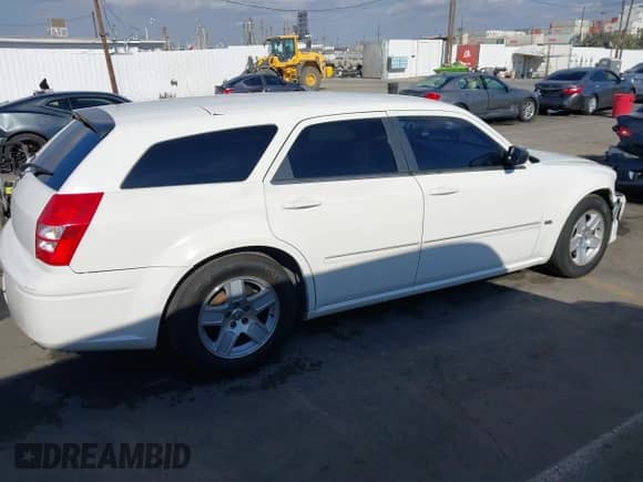 2006 Dodge Magnum с VIN 2D4FV47V66H430367, выставлен на аукционе IAAI как лот 41319330 с пробегом 140 786 миль миль и . История ставок и продаж доступна на DreamBid. Изображение 13.