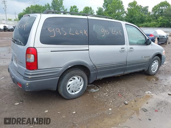 ✅ 2000 Pontiac Montana • VIN: 1GMDX03E7YD355008 • Lot: 42571157. Listed on IAAI with 221,655 mi. Free auction sales archive from the USA and detailed vehicle history report at DreamBid. Image 4.
