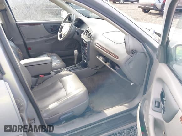 ✅ 1999 Oldsmobile Cutlass GLS • VIN: 1G3NG52M4X6319701 • Lot: 41616474. Wystawiony na IAAI z przebiegiem 177 667 mil. Bezpłatny archiwum sprzedaży aukcyjnych z USA i szczegółowy raport historii pojazdu na DreamBid. Zdjęcie 5.