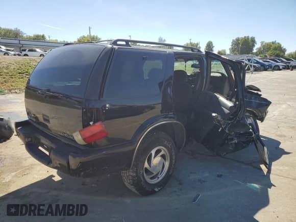 2001 Chevrolet Blazer LT с VIN 1GNDT13W112182576, выставлен на аукционе Copart как лот 74328974 с пробегом 117 751 миль миль и Списание • Salvage title. История ставок и продаж доступна на DreamBid. Изображение 3.