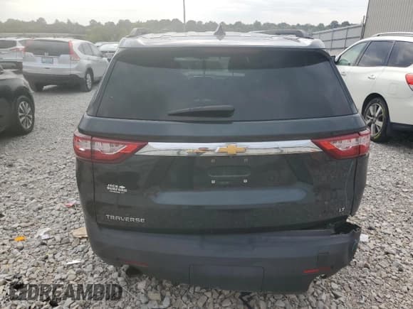 ✅ 2020 Chevrolet Traverse LT Cloth • VIN: 1GNERGKW5LJ130450 • Лот: 72054535. Опубликован ранее на Copart с пробегом 127 487 миль. Бесплатный доступ к архиву аукционных продаж из США и подробный отчёт об истории автомобиля на DreamBid. Изображение 6.