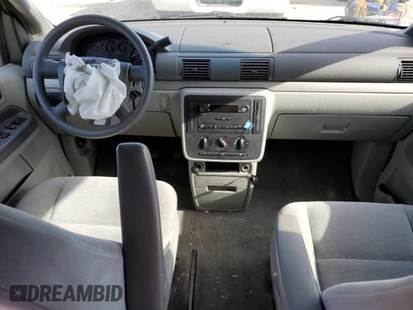 ✅ 2005 Ford Freestar S • VIN: 2FMZA50665BA04612 • Лот: 47424655. Опубликован ранее на Copart с пробегом Не указан. Бесплатный доступ к архиву аукционных продаж из США и подробный отчёт об истории автомобиля на DreamBid. Изображение 8.