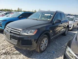 ✅ 2013 Volkswagen Touareg Sport • VIN: WVGEP9BP8DD013654 • Lot: 71978875. Wystawiony na Copart z przebiegiem 210 559 mil. Bezpłatny archiwum sprzedaży aukcyjnych z USA i szczegółowy raport historii pojazdu na DreamBid. Zdjęcie 1.