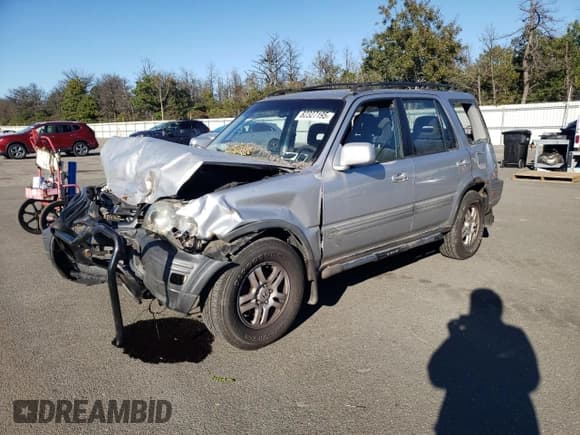 ✅ 2001 Honda CR-V EX • VIN: JHLRD18671C036460 • Lot: 82327195. Listed on Copart with 214,070 mi. Free auction sales archive from the USA and detailed vehicle history report at DreamBid. Image 1.