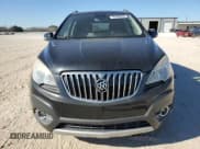 ✅ 2014 Buick Encore Convenience • VIN: KL4CJBSB3EB678803 • Lot: 44448515. Listed on Copart with 151,414 mi. Free auction sales archive from the USA and detailed vehicle history report at DreamBid. Image 5.