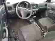 2007 Hyundai Accent GS z VIN KMHCM36C87U004056, wystawiony jako Copart lot #70292314 z przebiegiem 107 760 mil mil oraz Szkoda całkowita • Salvage title. Historia ofert i sprzedaży dostępna na DreamBid. Obrazek 8.