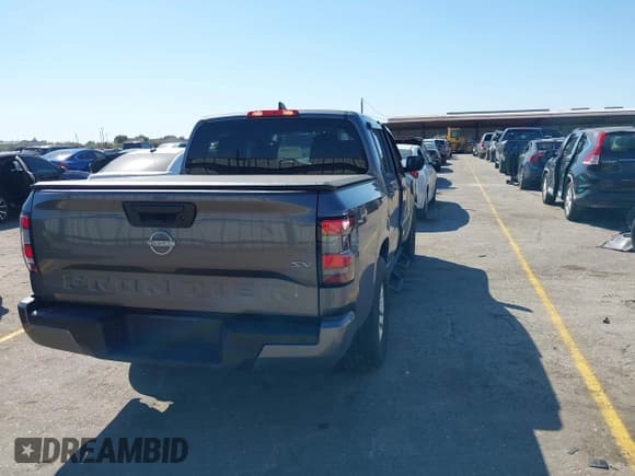 ✅ 2024 Nissan Frontier Pro-X • VIN: 1N6ED1EJ9RN628234 • Lot: 43419846. Listed on IAAI with 18,875 mi. Free auction sales archive from the USA and detailed vehicle history report at DreamBid. Image 4.