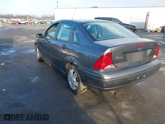 ✅ 2003 Ford Focus • VIN: 1FAHP34313W213941 • Lot: 41493687. Listed on IAAI with 258,673 mi. Free auction sales archive from the USA and detailed vehicle history report at DreamBid. Image 3.