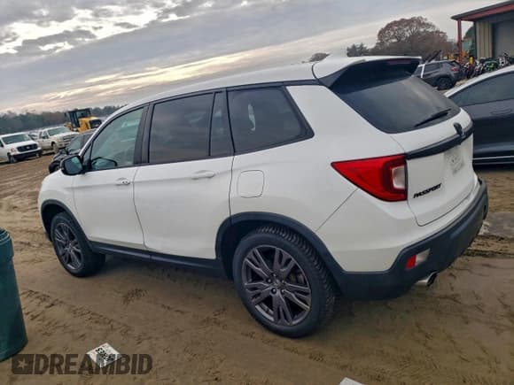 ✅ 2021 Honda Passport EX-L • VIN: 5FNYF8H59MB001820 • Lot: 93887975. Listed on Copart with 68,233 mi. Free auction sales archive from the USA and detailed vehicle history report at DreamBid. Image 2.