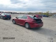 ✅ 2019 Toyota Camry Hybrid LE • VIN: 4T1B31HK9KU517669 • Lot: 43641281. Listed on IAAI with 122,704 mi. Free auction sales archive from the USA and detailed vehicle history report at DreamBid. Image 3.