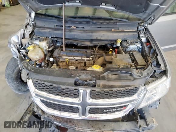 ✅ 2017 Dodge Journey SE • VIN: 3C4PDCAB9HT559971 • Лот: 80208395. Опубликован ранее на Copart с пробегом 119 903 миль. Бесплатный доступ к архиву аукционных продаж из США и подробный отчёт об истории автомобиля на DreamBid. Изображение 11.