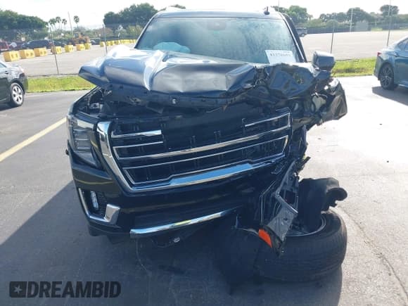 ✅ 2023 GMC Yukon SLT • VIN: 1GKS2BKD0PR131955 • Lot: 43378653. Listed on IAAI with 39,975 mi. Free auction sales archive from the USA and detailed vehicle history report at DreamBid. Image 18.