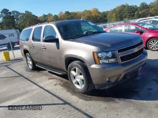 ✅ 2011 Chevrolet Suburban LT • VIN: 1GNSCJE03BR298614 • Lot: 43630609. Listed on IAAI with 139,769 mi. Free auction sales archive from the USA and detailed vehicle history report at DreamBid. Image 1.