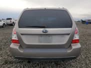 ✅ 2006 Subaru Forester X • VIN: JF1SG65646H742261 • Лот: 91925625. Опубликован ранее на Copart с пробегом 173 733 миль. Бесплатный доступ к архиву аукционных продаж из США и подробный отчёт об истории автомобиля на DreamBid. Изображение 6.