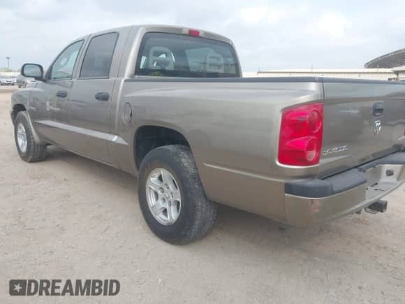 2006 Dodge Dakota SLT with VIN 1D7HE48N16S703072, listed as a IAAI auction lot 42156709 with 102,919 mi miles and . Bid and sale history available at DreamBid. Image 3.