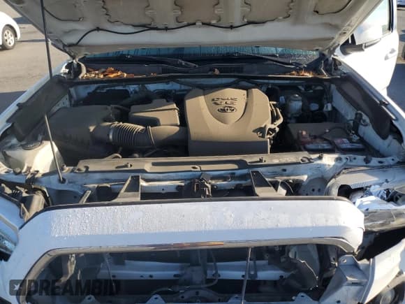 ✅ 2018 Toyota Tacoma SR5 • VIN: 5TFAZ5CN6JX067676 • Лот: 91860595. Опубликован ранее на Copart с пробегом 103 415 миль. Бесплатный доступ к архиву аукционных продаж из США и подробный отчёт об истории автомобиля на DreamBid. Изображение 11.