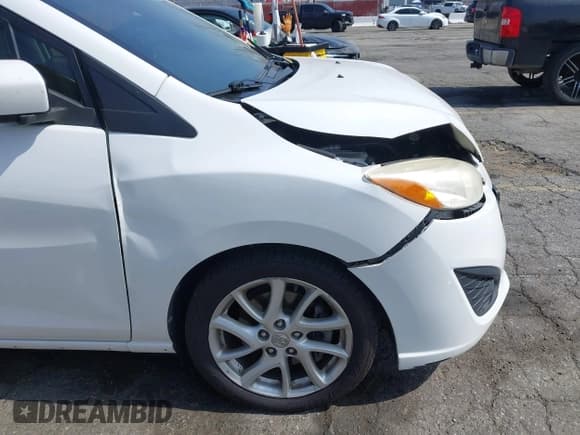 ✅ 2012 Mazda 5 Touring • VIN: JM1CW2CL2C0125776 • Lot: 42496258. Wystawiony na IAAI z przebiegiem 130 522 mil. Bezpłatny archiwum sprzedaży aukcyjnych z USA i szczegółowy raport historii pojazdu na DreamBid. Zdjęcie 14.