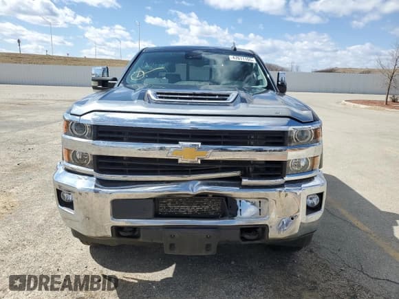 ✅ 2017 Chevrolet Silverado 1500 • VIN: 100000000016199W1 • Лот: 47011105. Опубликован ранее на Copart с пробегом 128 779 миль. Бесплатный доступ к архиву аукционных продаж из США и подробный отчёт об истории автомобиля на DreamBid. Изображение 5.