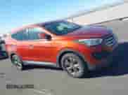 2015 Hyundai Santa Fe z VIN 5XYZTDLBXFG266793, wystawiony jako IAAI lot #43588575 z przebiegiem 129 838 mil mil oraz . Historia ofert i sprzedaży dostępna na DreamBid. Obrazek 13.