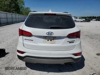 ✅ 2018 Hyundai Santa Fe Ultimate • VIN: 5XYZWDLA0JG549839 • Лот: 51092454. Опубликован ранее на Copart с пробегом 44 029 миль. Бесплатный доступ к архиву аукционных продаж из США и подробный отчёт об истории автомобиля на DreamBid. Изображение 6.