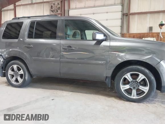✅ 2015 Honda Pilot SE • VIN: 5FNYF4H32FB046446 • Lot: 42995806. Listed on IAAI with 137,831 mi. Free auction sales archive from the USA and detailed vehicle history report at DreamBid. Image 6.