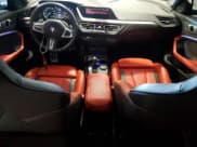 ✅ 2021 BMW 2 Series M235i xDrive • VIN: WBA13AL01M7G56055 • Lot: 61749965. Listed on Copart with 35,272 mi. Free auction sales archive from the USA and detailed vehicle history report at DreamBid. Image 8.