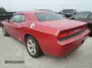 2012 Dodge Challenger SXT z VIN 2C3CDYAG9CH210824, wystawiony jako Copart lot #76201764 z przebiegiem 97 698 mil mil oraz Nie do naprawy • Non repairable. Historia ofert i sprzedaży dostępna na DreamBid. Obrazek 2.