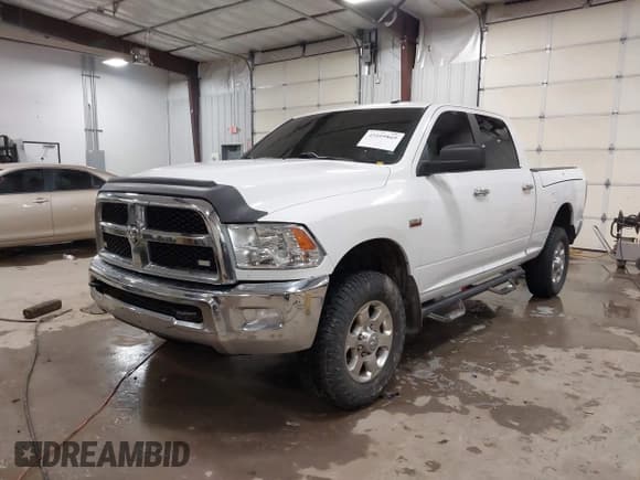 ✅ 2018 Ram 2500 SLT • VIN: 3C6TR5DTXJG284102 • Lot: 41609869. Listed on IAAI with 148,869 mi. Free auction sales archive from the USA and detailed vehicle history report at DreamBid. Image 2.