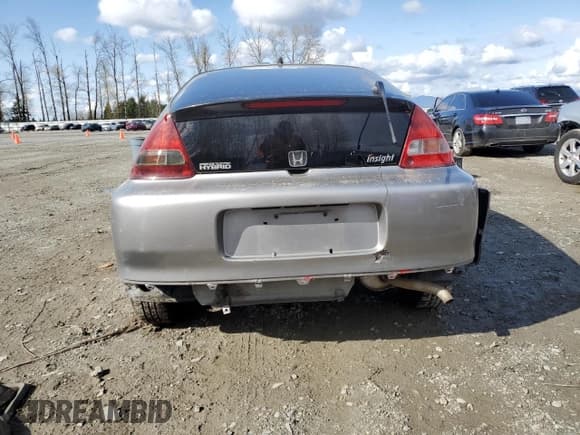 ✅ 2000 Honda Insight • VIN: JHMZE1355YT002857 • Lot: 51543705. Listed on Copart with 169,522 mi. Free auction sales archive from the USA and detailed vehicle history report at DreamBid. Image 6.