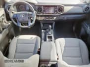 ✅ 2021 Toyota Tacoma SR • VIN: 3TYAX5GN4MT031144 • Лот: 80266065. Опубликован ранее на Copart с пробегом 68 941 миль. Бесплатный доступ к архиву аукционных продаж из США и подробный отчёт об истории автомобиля на DreamBid. Изображение 8.