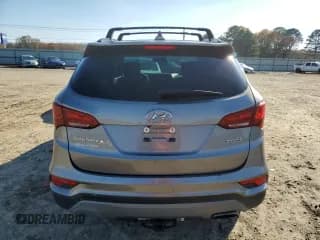 ✅ 2018 Hyundai Santa Fe 2.4L • VIN: 5NMZU3LB2JH103562 • Лот: 69069492. Опубликован ранее на Copart с пробегом 63 489 миль. Бесплатный доступ к архиву аукционных продаж из США и подробный отчёт об истории автомобиля на DreamBid. Изображение 6.