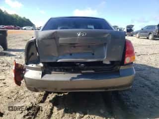 2004 Hyundai Accent GL z VIN KMHCG45C64U506817, wystawiony jako Copart lot #66365085 z przebiegiem 58 940 mil mil oraz Szkoda całkowita • Salvage title. Historia ofert i sprzedaży dostępna na DreamBid. Obrazek 6.