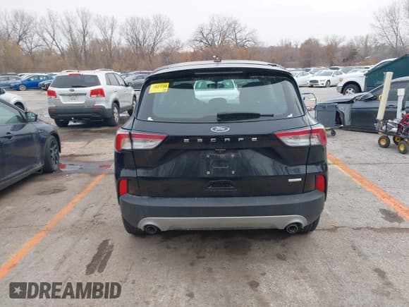 ✅ 2020 Ford Escape S • VIN: 1FMCU0F63LUB38587 • Lot: 43738043. Listed on IAAI with 85,167 mi. Free auction sales archive from the USA and detailed vehicle history report at DreamBid. Image 16.