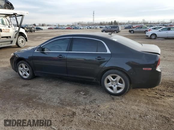 ✅ 2010 Chevrolet Malibu 1LS • VIN: 1G1ZB5E05A4151782 • Lot: 82392534. Listed on Copart with 294,896 mi. Free auction sales archive from the USA and detailed vehicle history report at DreamBid. Image 2.