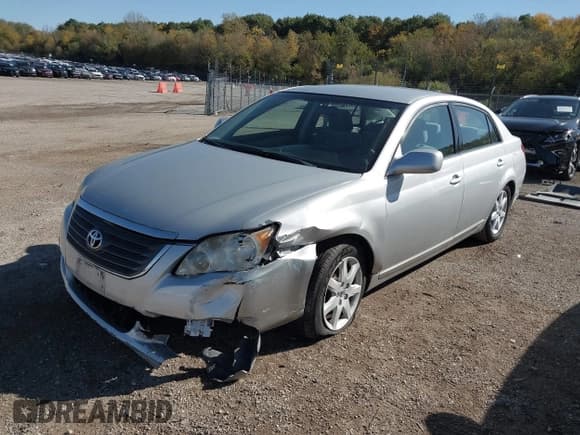 ✅ 2009 Toyota Avalon Limited • VIN: 4T1BK36B69U339327 • Lot: 43495405. Listed on IAAI with 99,003 mi. Free auction sales archive from the USA and detailed vehicle history report at DreamBid. Image 2.