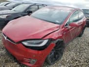 ✅ 2017 Tesla Model X P90D • VIN: 5YJXCAE40HF074961 • Lot: 52598084. Listed on Copart with Not provided. Free auction sales archive from the USA and detailed vehicle history report at DreamBid. Image 1.