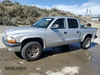 2003 Dodge Dakota Sport z VIN 1D7HG38N03S158272, wystawiony jako Copart lot #52239655 z przebiegiem 259 687 mil mil oraz Szkoda całkowita • Salvage title. Historia ofert i sprzedaży dostępna na DreamBid. Obrazek 1.
