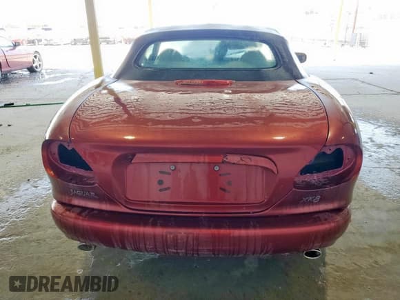✅ 1997 Jaguar XK • VIN: SAJGX2748VC017750 • Лот: 67491285. Опубликован ранее на Copart с пробегом Не указан. Бесплатный доступ к архиву аукционных продаж из США и подробный отчёт об истории автомобиля на DreamBid. Изображение 6.