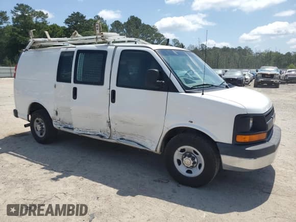 ✅ 2014 Chevrolet Express Cargo • VIN: 1GCWGFCA6E1159071 • Lot: 57384325. Listed on Copart with 203,891 mi. Free auction sales archive from the USA and detailed vehicle history report at DreamBid. Image 4.