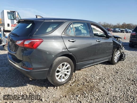 ✅ 2018 Chevrolet Equinox LS • VIN: 2GNAXHEV8J6105601 • Лот: 91665455. Опубликован ранее на Copart с пробегом 187 965 миль. Бесплатный доступ к архиву аукционных продаж из США и подробный отчёт об истории автомобиля на DreamBid. Изображение 3.