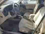 2002 Hyundai Elantra GLS z VIN KMHDN45D22U371819, wystawiony jako Copart lot #77000954 z przebiegiem 177 202 mil mil oraz Szkoda całkowita • Salvage title. Historia ofert i sprzedaży dostępna na DreamBid. Obrazek 7.