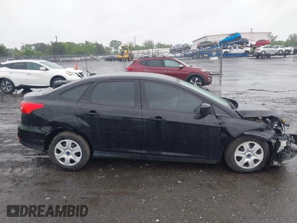✅ 2017 Ford Focus S • VIN: 1FADP3E27HL201371 • Lot: 42258266. Wystawiony na IAAI z przebiegiem 68 872 mil. Bezpłatny archiwum sprzedaży aukcyjnych z USA i szczegółowy raport historii pojazdu na DreamBid. Zdjęcie 14.